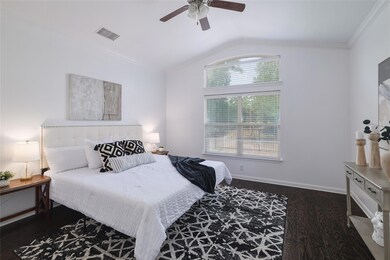 Bedroom with visible vents, ornamental molding, w