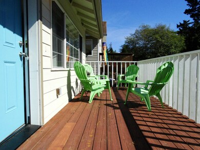 Deck, front door to the left.