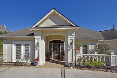Step onto the covered porch with flagstone pavers to begin your tour of this stunning custom home that is bursting with character and charm.  A covered entry protects guests from the elements as they arrive.