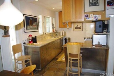 The Kitchen has updated cabinets and granite count