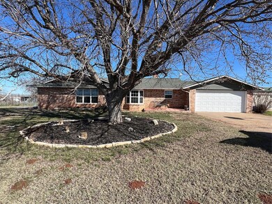 Single story home featuring a garage