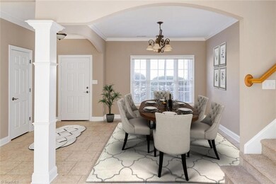 Open dining area can be formal or informal.  Look at the beautiful arched architecture!