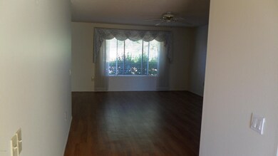 VIEW OF LIVING ROOM FROM FRONT DOOR