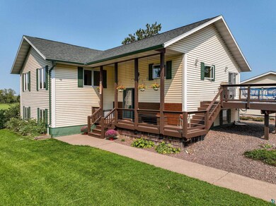 View of front of property with a front yard and a 