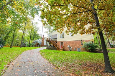 Another view from culdesac showing rear driveway.