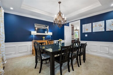Beautiful Dining Room with Tray Ceiling