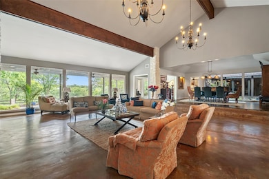 Living area with finished concrete flooring, a ch