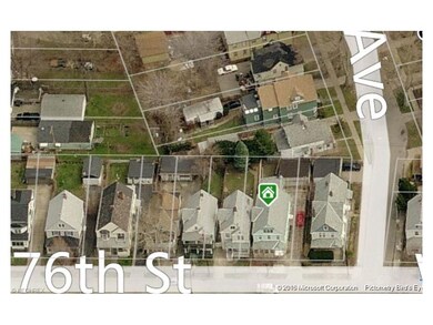 Aerial view of the neighborhood. The green symbol 