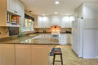 Renovated, large kitchen with granite counter tops