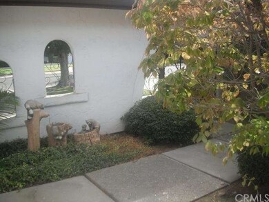 Inside courtyard to front door.