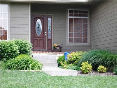 The covered front porch welcomes guests.