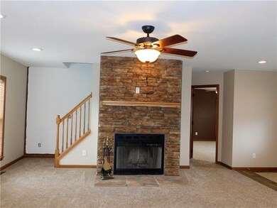 Wow.... that fireplace! Recessed lighting and a ce