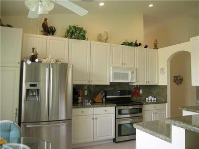 Kitchen. Notice extra thick granite.  Popular brea