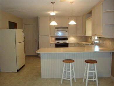 Snack bar with pendant lighting, and under cabinet