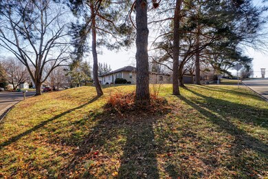 Large corner lot,  that is in walking distance to shopping, restaurants, and easy highway access