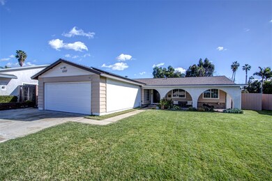 Large grassy front yard