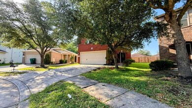 Front of the Two-story brick house with a double g