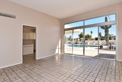 Area off kitchen w/sliding glass doors.