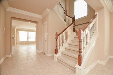 This photo showcases a spacious and bright entrywa