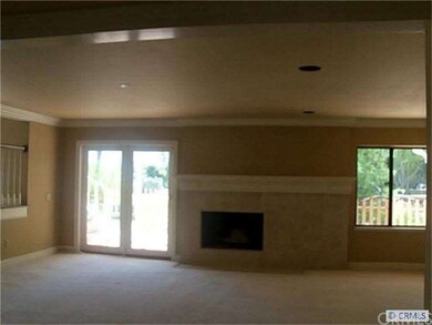 Generous Family Room with Cozy fireplace and Frenc