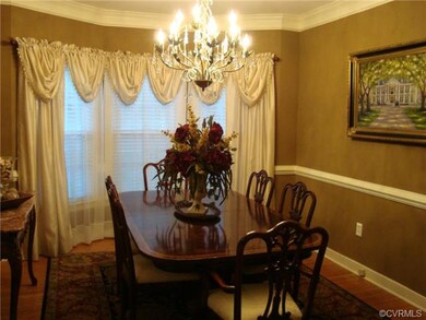 Formal Dining with custom paint, chair rail, wood 