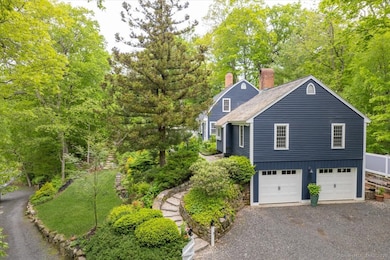 The private driveway leads to the spacious 544-square-foot double-bay garage.