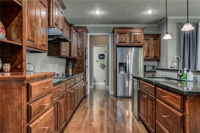 This gorgeous kitchen showcases a plethora of rich