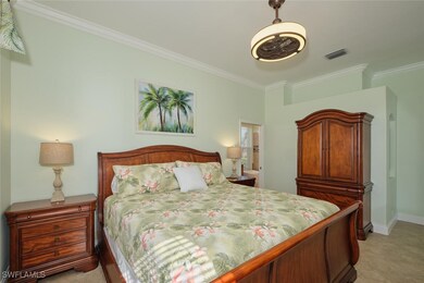 Bedroom featuring ornamental molding and baseboard