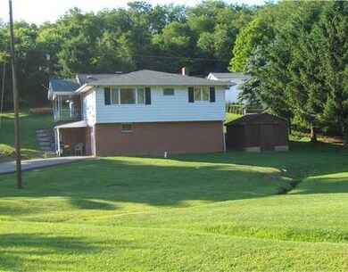 View. Side view showing large storage shed.