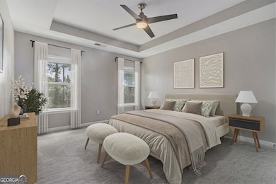 Upstairs, the Oversized Owner's Suite provides a Serene Retreat with Trey Ceilings, a Spa-Inspired Bathroom complete with a Glass Shower and Bench, Double Vanity Sinks, and a Large Walk-In Closet