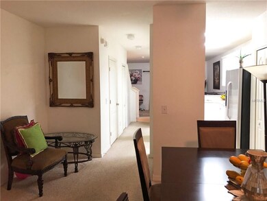 Dining room to kitchen and hall to half bath and l