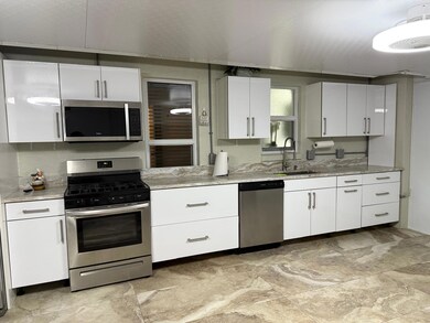 1077 Fernlea Dr unit B, West Palm Beach, FL 33417 - photo 2