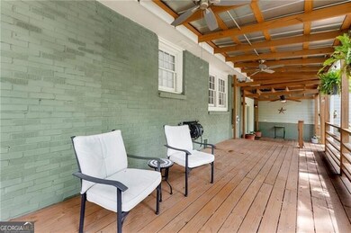 Wooden deck with a ceiling fan