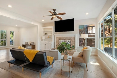 Living area featuring tile patterned flooring, re