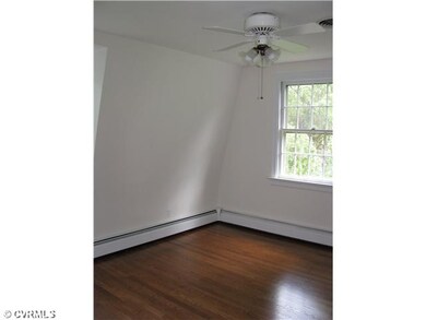 Bedroom - New paint and newly refinished floors.