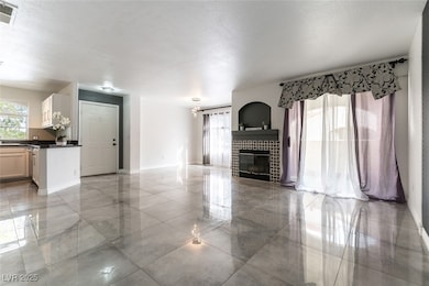 Unfurnished living room featuring a wealth of natu