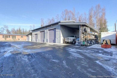 3 Car Garage & 2 Carports!