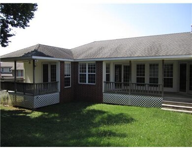 Exterior Back/Side. Master bedroom has private pat