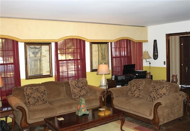 Living area featuring wood finished floors