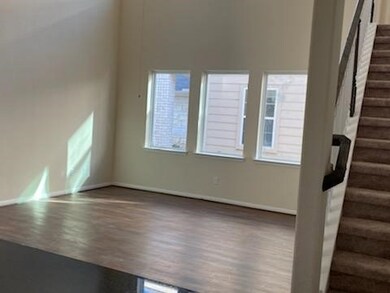 Bright  and nicely sized living room looking from