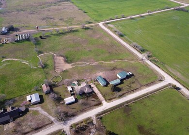 Trees in the east and south fence lines of this 3.038 acres.