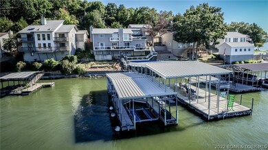 Easy dock access in the mouth of a wide cove off the more quiet Niangua arm but close to the main channel of the Osage.