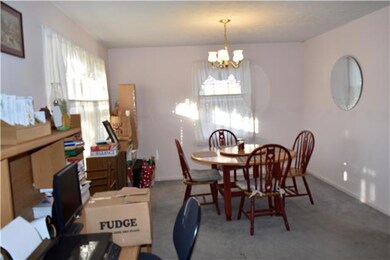 Formal dining room. Seller is in the middle of packing so some rooms are not pictured. More photos coming soon.