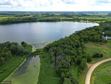 Wonderful heavily wooded lot spanning alongside 330 feet of Camp Lake.