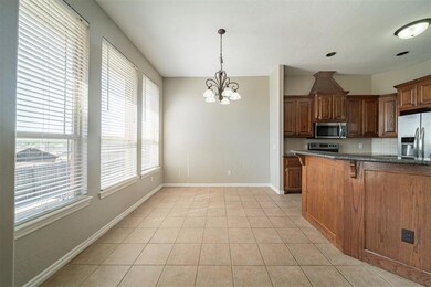 Kitchen featuring appliances with stainless steel 