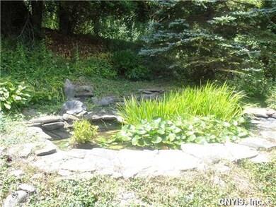 Yard/Garden. Beautiful lily pond provides a place 