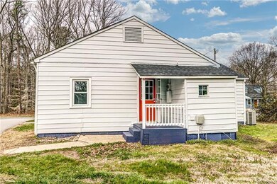 Rear view of home- 2nd entry/cute covered porch!