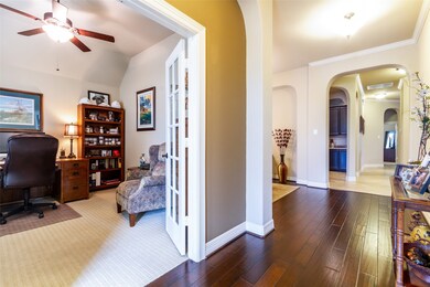 Hardwoods welcome you in this large foyer.