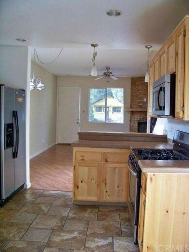 Dining area and breakfast bar and open to living r