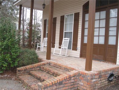 Brick facing with decorative vents